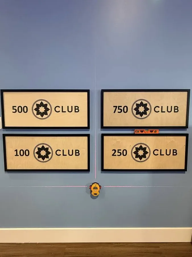 Precision wall mounting laser level