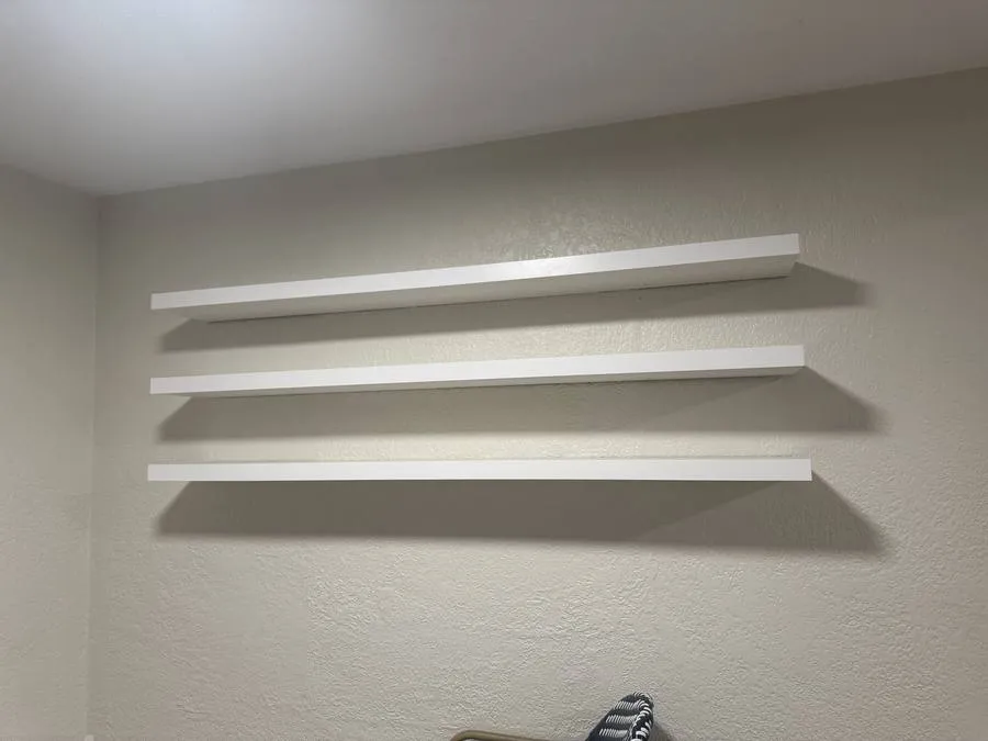 Floating white shelves